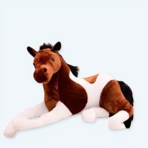 Cavallo bianco di peluche marrone