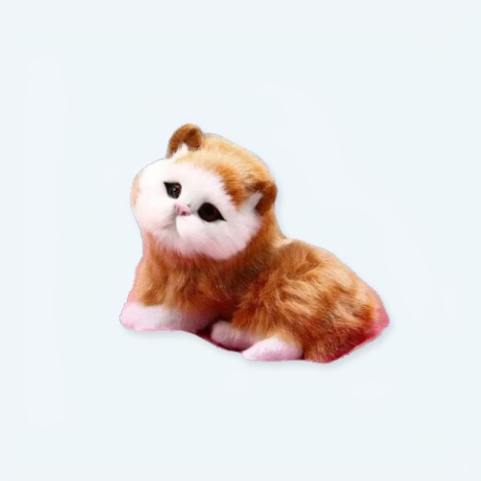 Gatto giocattolo coccoloso con pelo rosso