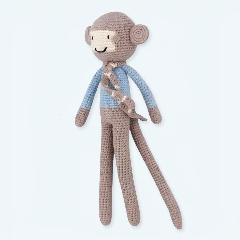 Scimmia di peluche lavorata a maglia