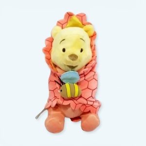 Peluche Winnie the Pooh nella sua coperta