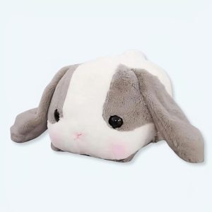 Coniglio grigio di peluche sdraiato